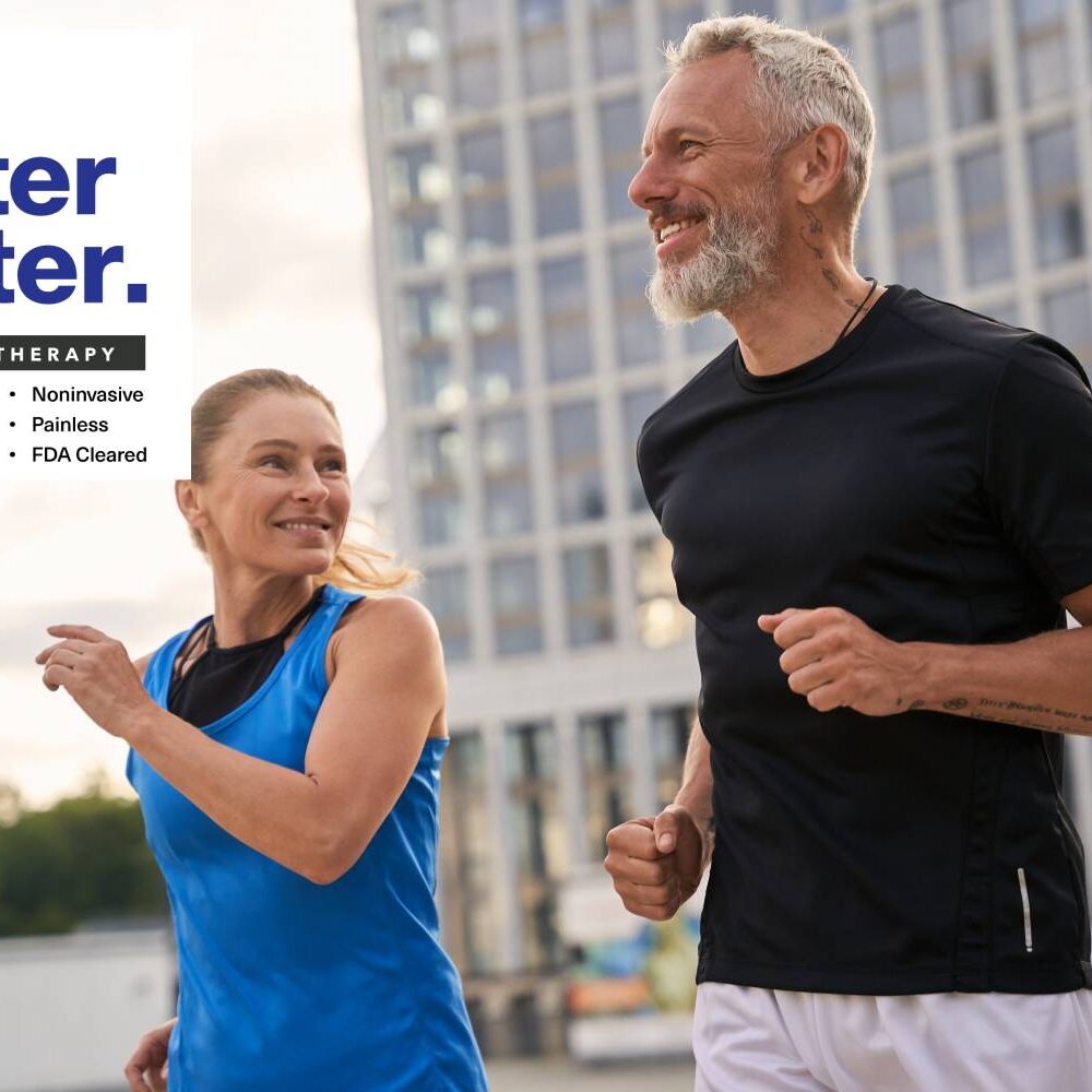 man and woman in sportswear looking happy while jogging